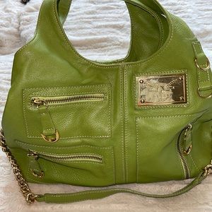 Guia’s green Italian leather should purse GUC